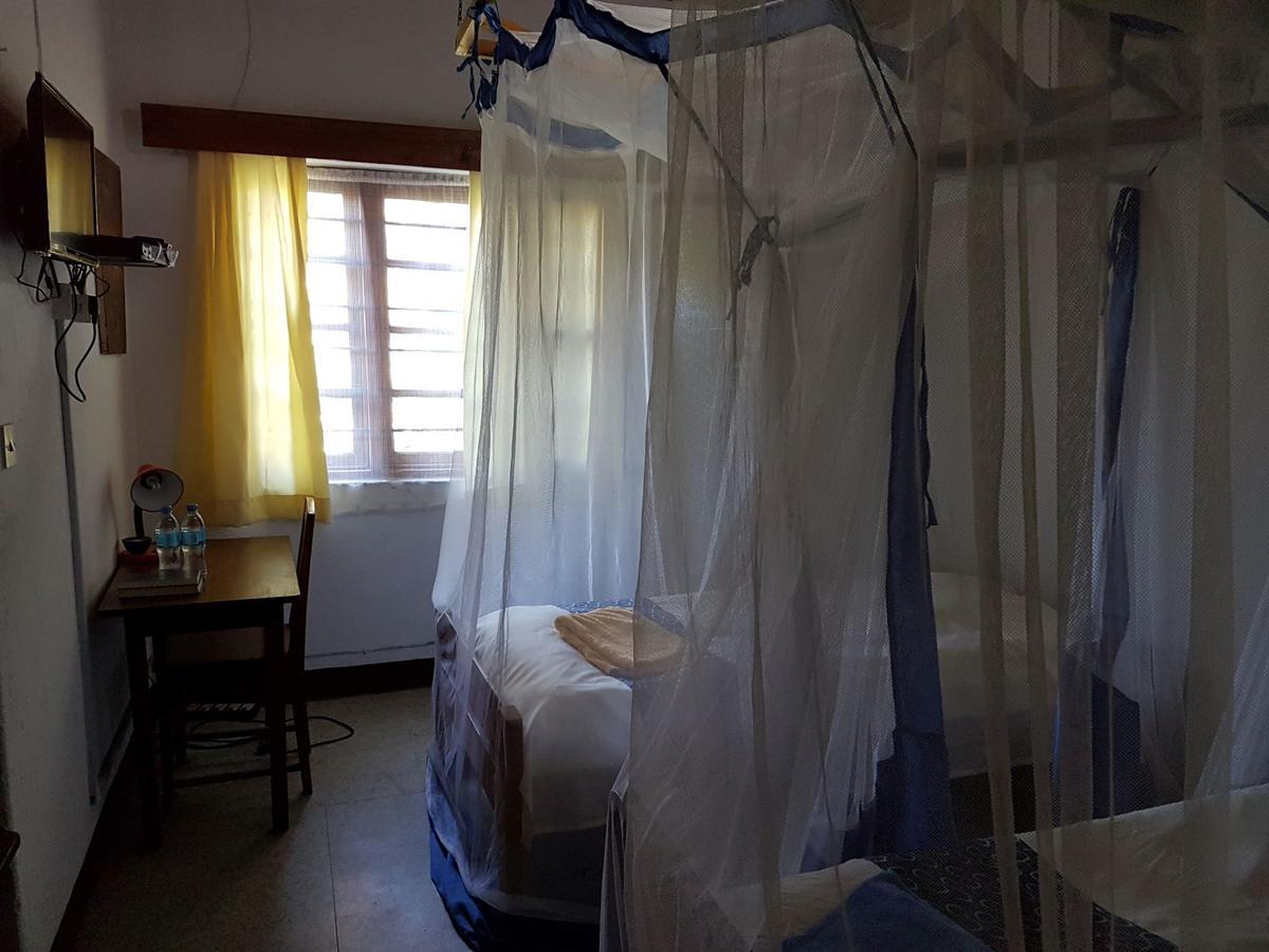 Karibuni Center Hotel Mbeya Bagian luar foto